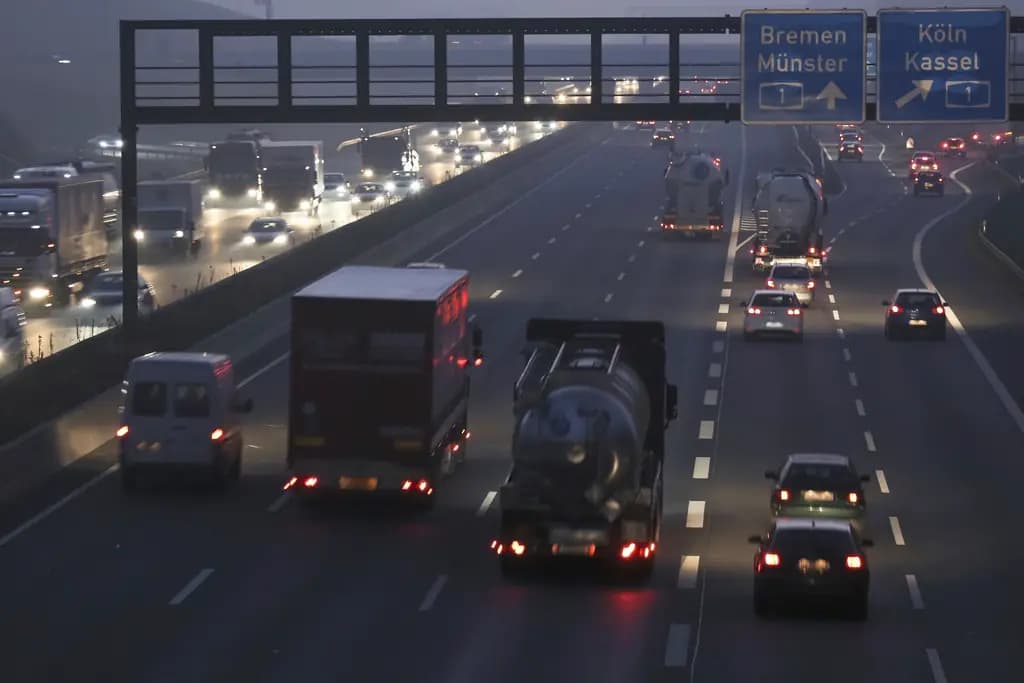 Freight traffic on a motorway at dusk